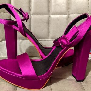 Women's purple open toed pumps